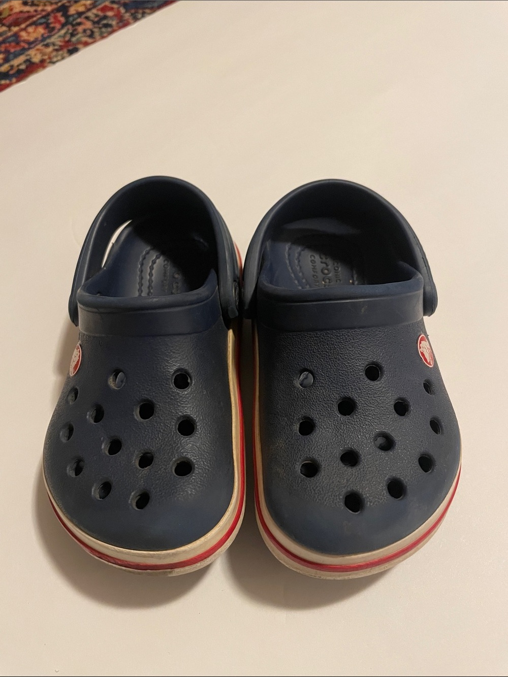 CROCS Kids Navy Clogs with Red and White Trim
